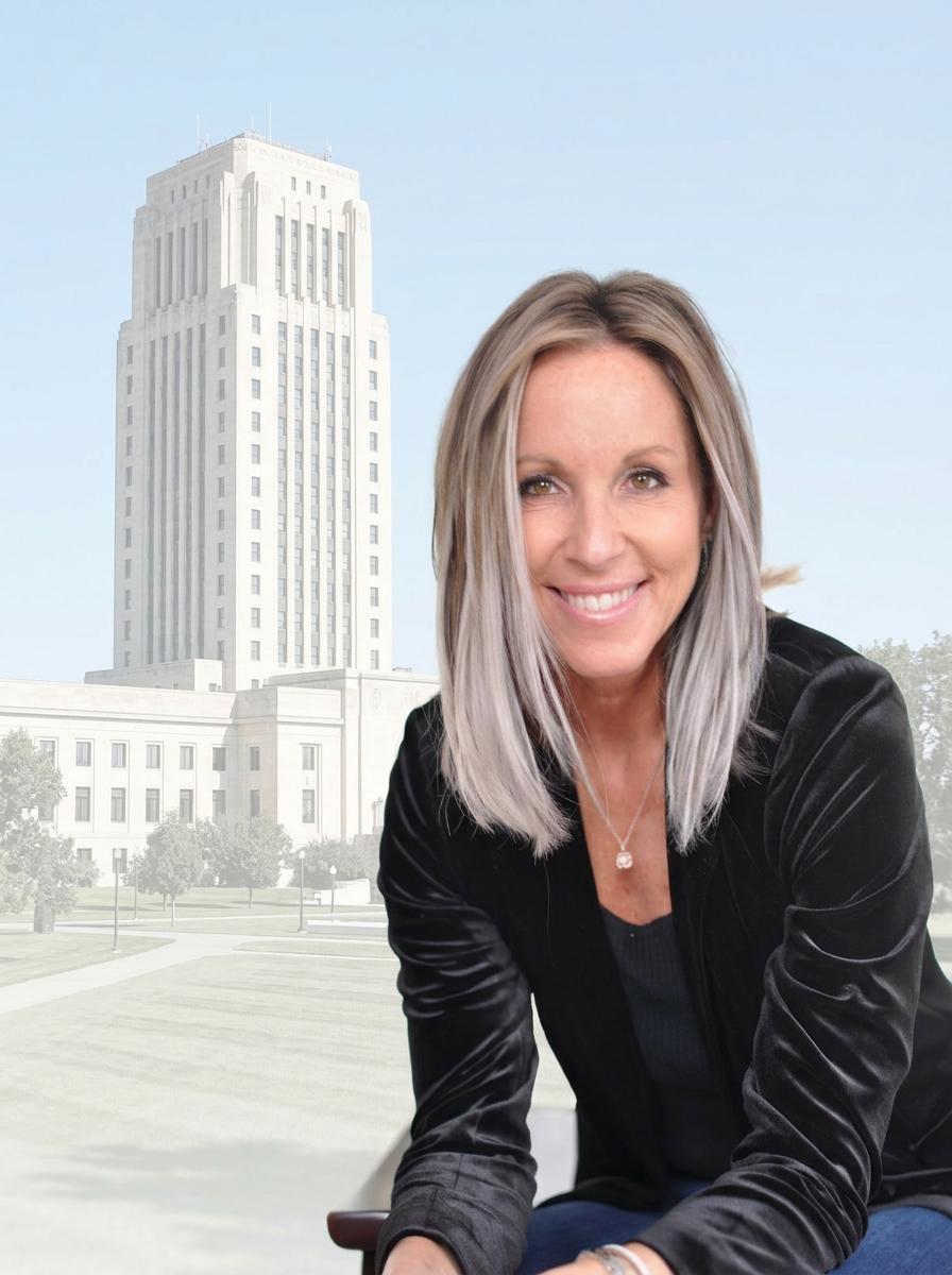 Jennifer Benson in front of the North Dakota State Capitol in Bismarck